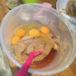 adding eggs and vanilla extract